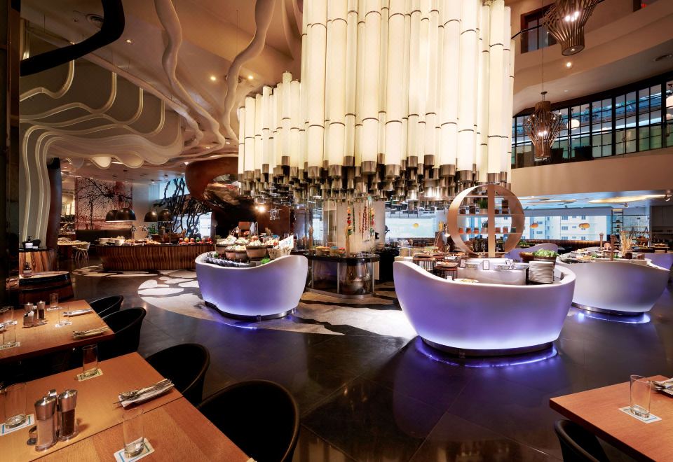Lounge and dining interior — Hilton Kuala Lumpur