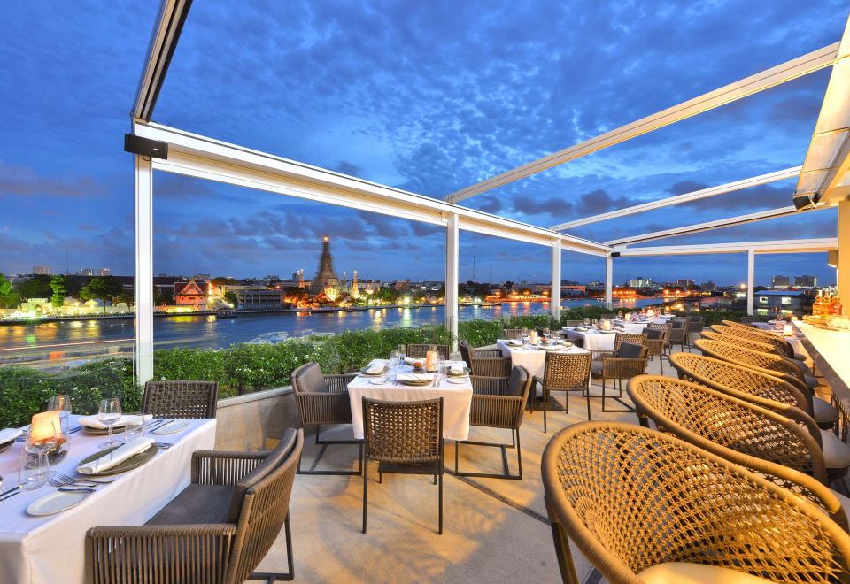 Rooftop dining terrace — Riva Arun Bangkok